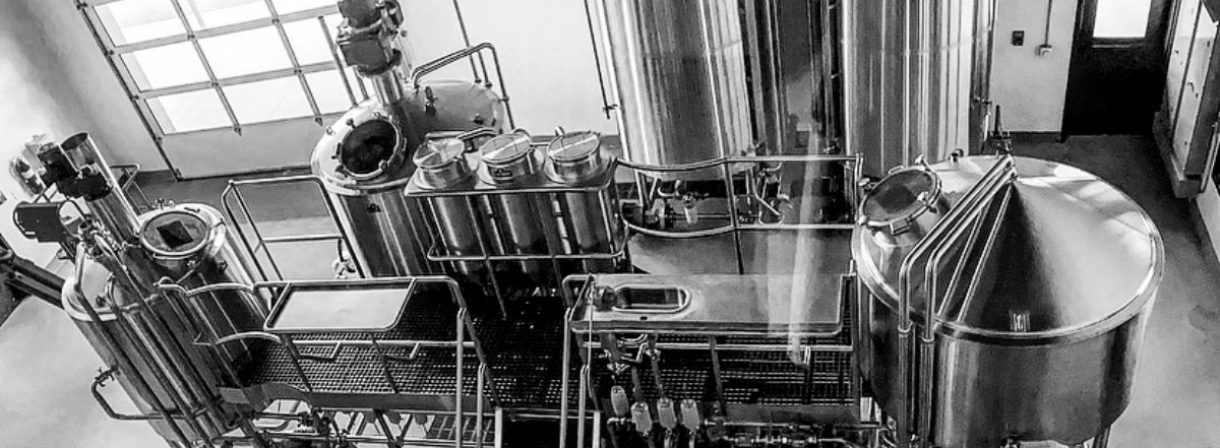 Black & White Picture Of Distilling Equipment